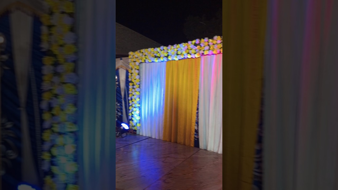 Beautiful Mehndi Backdrop Decor with Artificial Flowers |