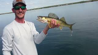 catching big bass and a surprise walleye on the St Lawrence