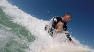 Falling off surfboard