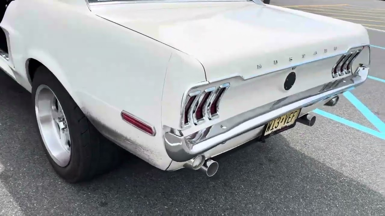 HARM mufflers on a classic mustang - coyote swapped.