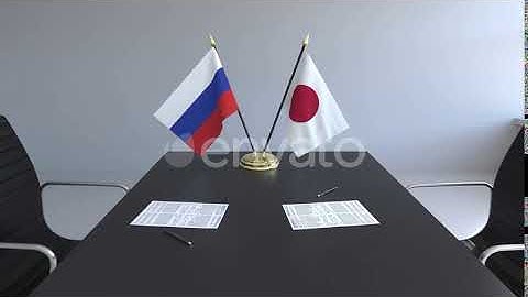 Flags of Russia and Japan on the Table | Motion Graphics - Envato elements
