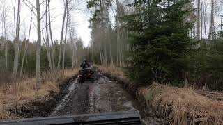 Mudding around in some bone stock ATV-s.