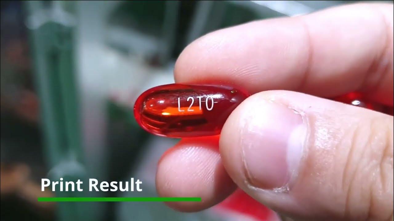 Laser printing machine with visual inspection for gelatin capsules