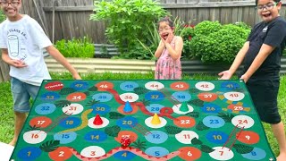 Giant Board Game Challenge Playing Giant Snakes and Ladders | Ludo snake and ladder