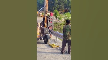 Process of installing guardrail on highway curves- Good tools and machinery make work easy