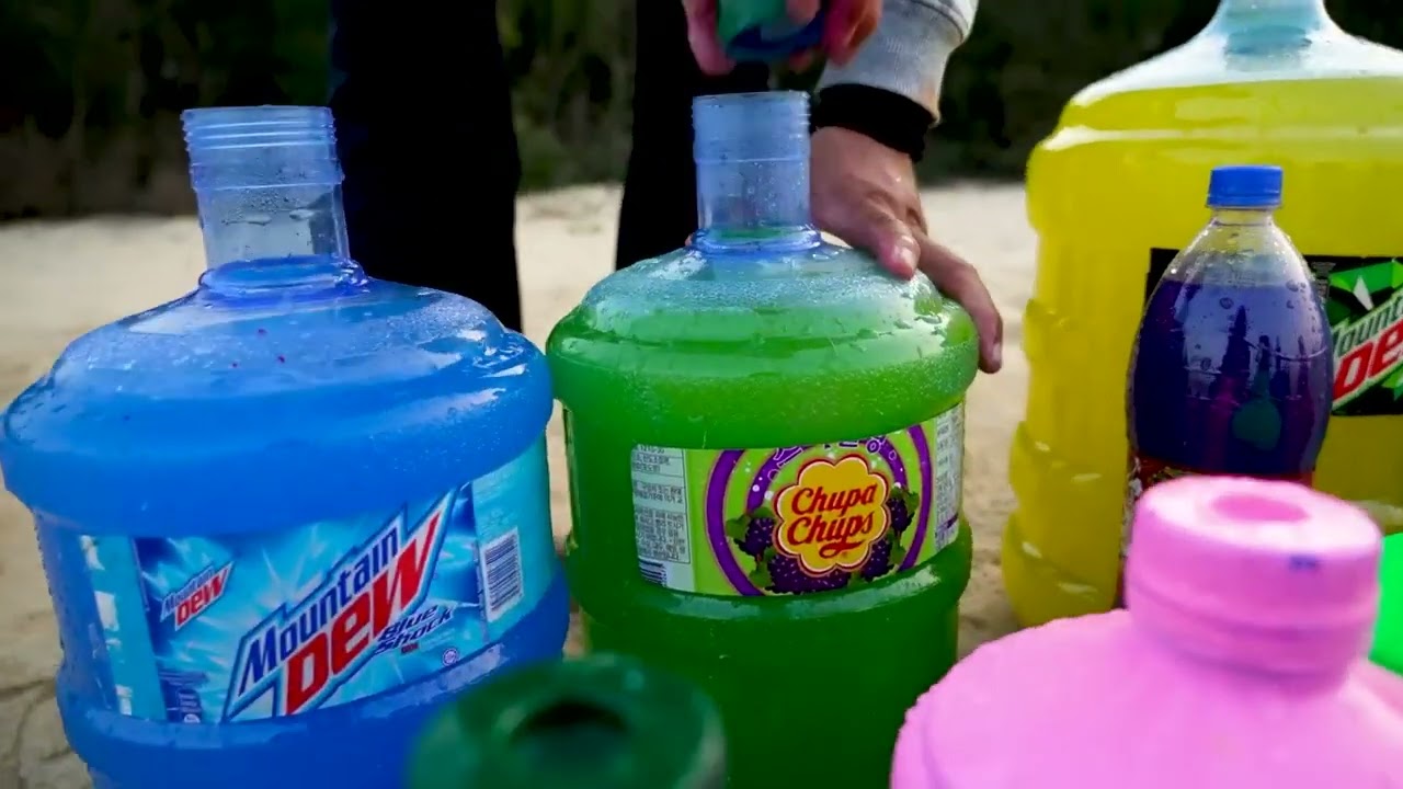 EXPERIMENT  Big Balloons from Toothpaste Eruption with Giant Mtn Dew, Fanta, Mirinda, Cola & Mentos