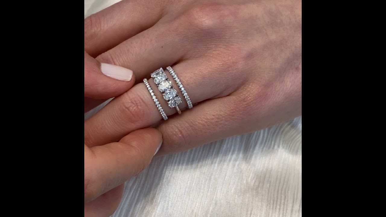 Floating Five Stone Oval Shape Diamond Band