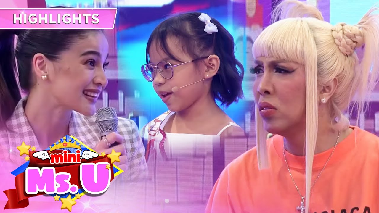 Vice is confused by the conversation between Anne and Mini Miss U