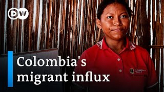 How 2.5 million migrants from Venezuela try to make a living in Colombia | DW News