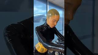 Girl Working Out In Latex Mask