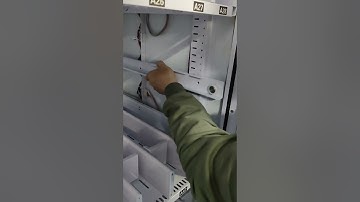 Instruction how to change the vending machine good tray from pusher to spiral slot