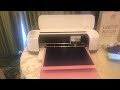 The New Cricut Maker Machine in action  using the new fabric mat cutting Faux Leather