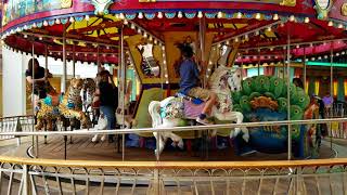 Mom Rides The Merry Go Round
