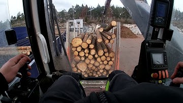 Unloading a load of Timber From a Timbertruck