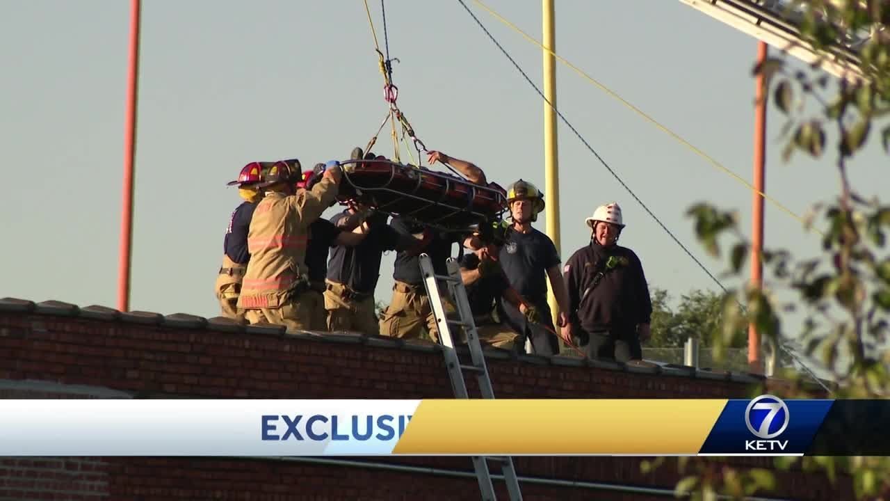 One person pinned, two other people injured after partial building ...