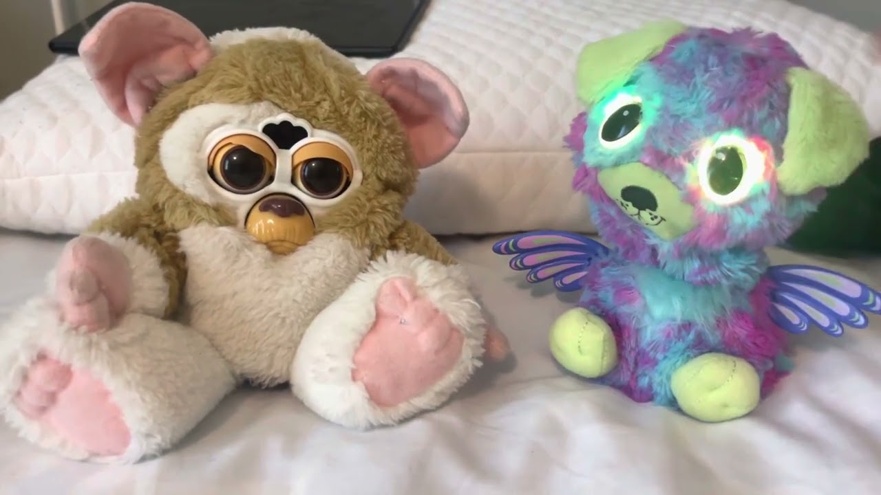 Gizmo Furby and purple/blue Hatchimal dog￼
