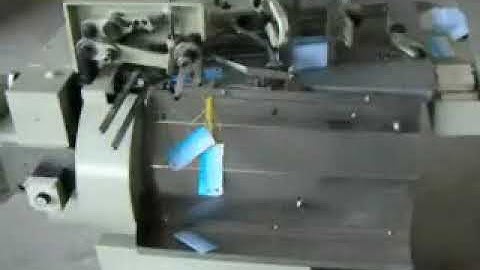 Automatic Tag Punching & Threading Machine 2