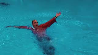 Splash! UofL coach tossed in pool following championship