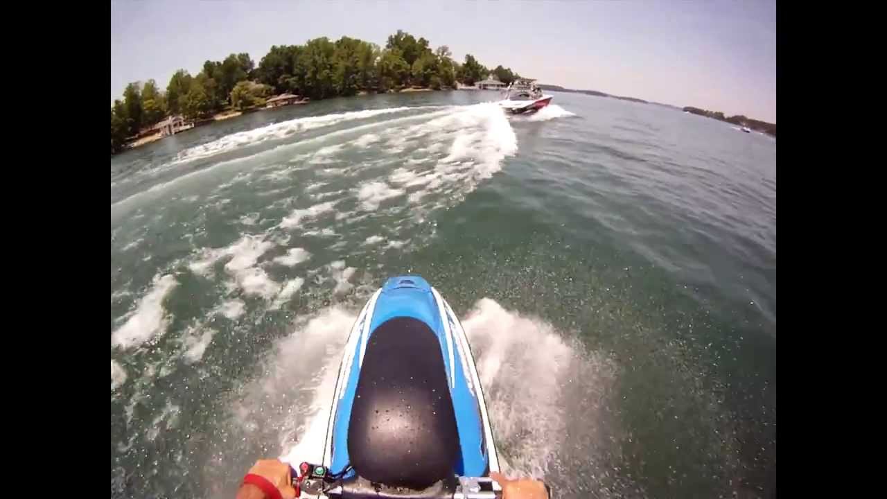 Standup jetski jumping behind wakeboard boat YouTube