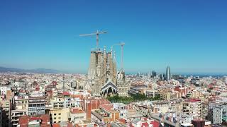 Aerial Stock Footage: Flying Drone over Sagrada Familia in City Barcelona - Eixample District 4k