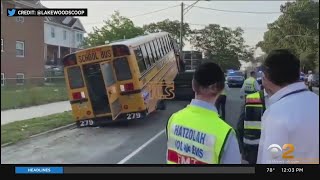 School Bus Crashes On Top Of Car In Lakewood, N.J.