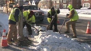 Workers brave bitter cold