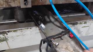 Progressive die with floating mandrel