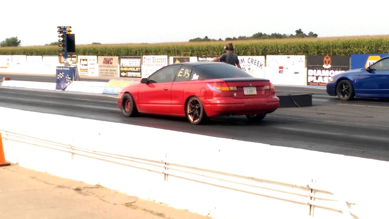 Lil Saturn action 12.8sec vs 600whp cobra
