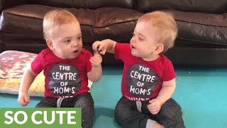 Identical twins each want the other's pacifier