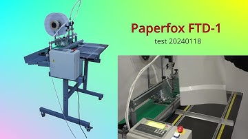 Taping tracing paper with a Paperfox FTD-1 adhesive tape applicator.