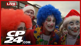 Torontos Annual Santa Claus Parade Begins With Smiles, Music, And Clowns