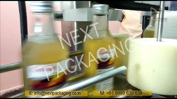 Automatic High-Speed Sticker Labeling Machine for liquor bottles | Glass bottle labeling Machine