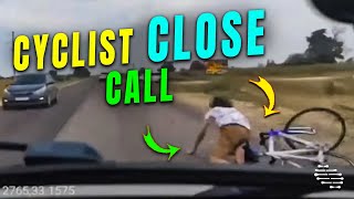 Driver Barely Misses a Falling Cyclist