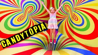 jumping in a pool of a million marshmallows at candytopia