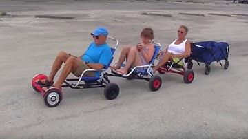 HoverSeat train of 2 and 3 people with cargo wagon.