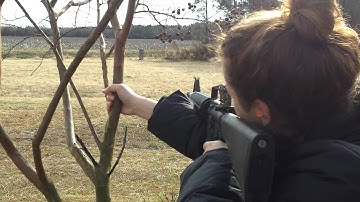 Girlfriend shooting exploding target