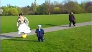 Mom Drills Kid in face with soccer ball.flv