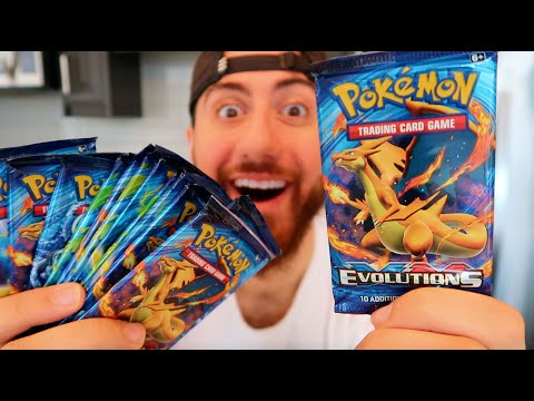 Opening Evolutions Booster Packs Until I Pull A CHARIZARD!