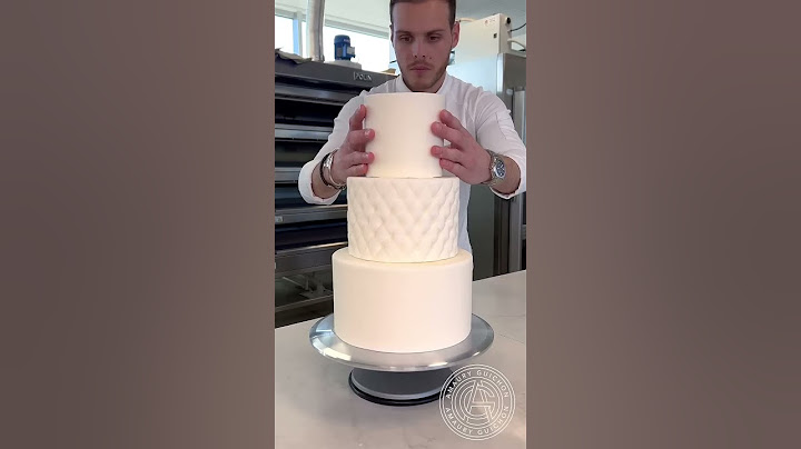Wedding Cake! 🍰 Simple, yet elegant with a pulled sugar cake topper!