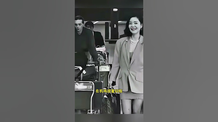 1991年，邓丽君和小15岁的摄影师男友保罗在机场甜蜜同框 #历史文化 #老照片 #历史 #怀旧 #历史人物