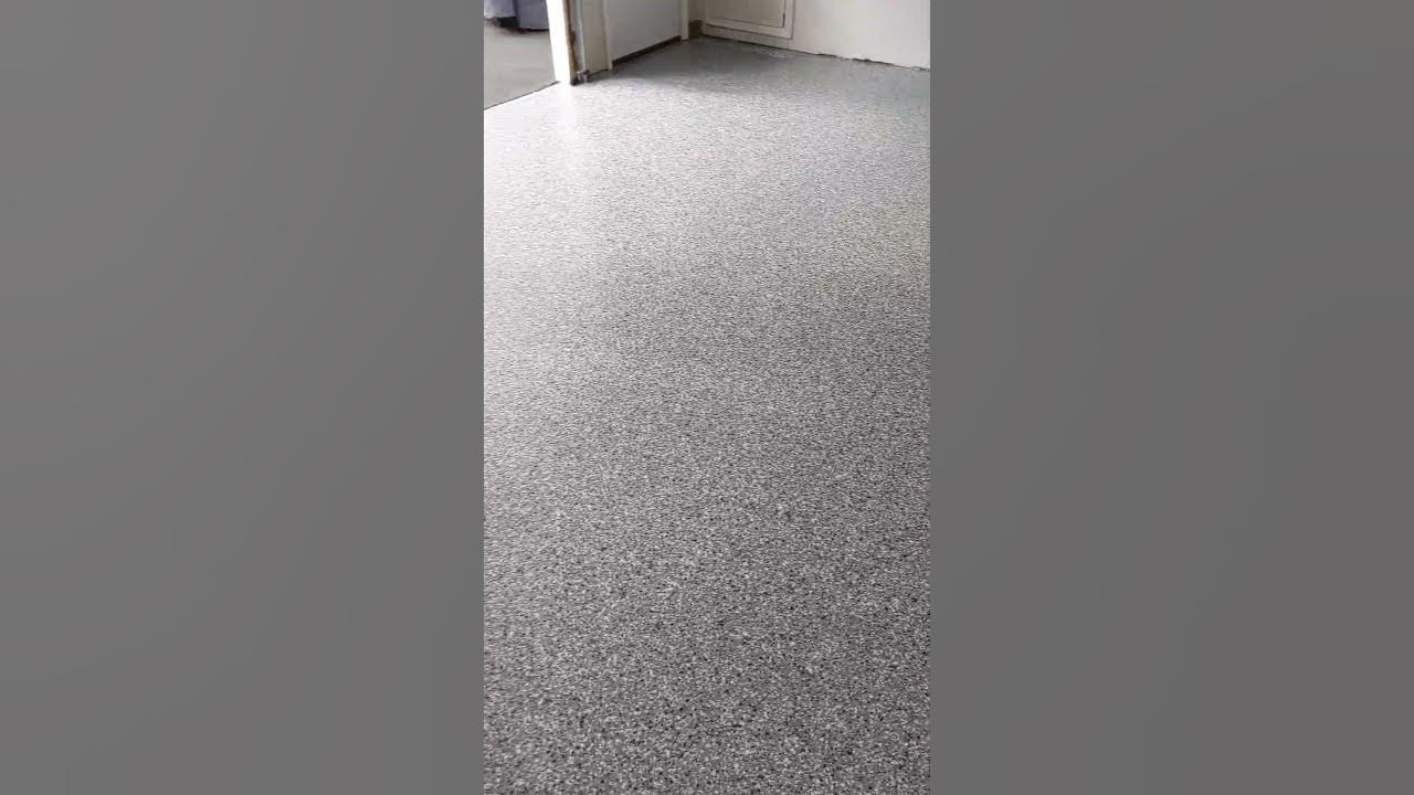 New Epoxy and Polyaspartic flake floor in this garage in a Wombat flake
