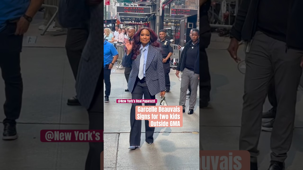 Garcelle Beauvais wears GUCCI TIE, shirt, jacket as leaving GMA studios 