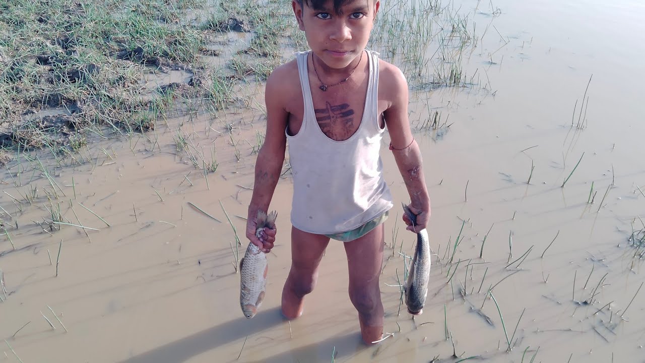 Amazing Boy Catching Big Catfish In Mud Water || Hand Fishing For ...