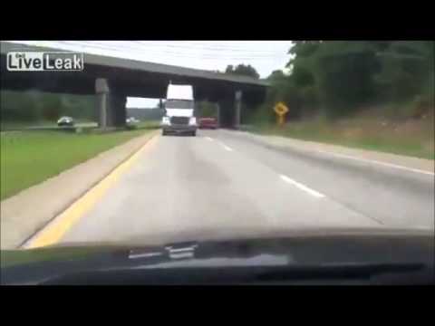 honey-wake-up-it's-a-truck!---man-plays-truck-prank-on-wife-while-driving