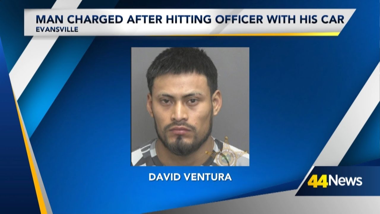 Man charges after hitting officer with his car, police say - YouTube
