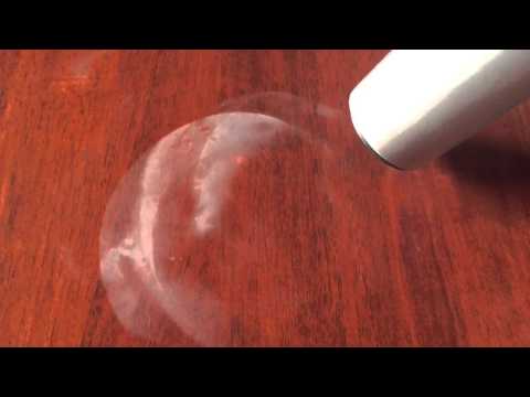 How to clean white marks off a polished wooden tabletop.