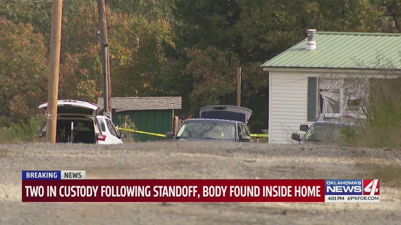 Two in custody following standoff, body found inside home - YouTube
