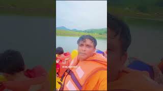 Enjoying a serene boat ride. The tranquil waters and picturesque landscape provide a perfect escape
