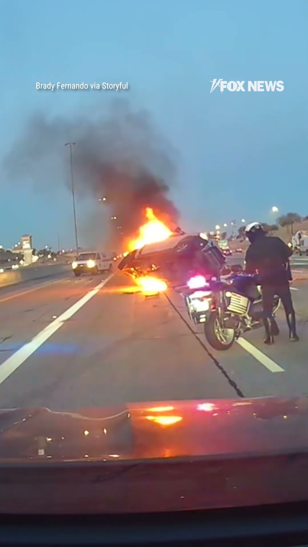 Pickup catches fire after being rear-ended by cement truck.