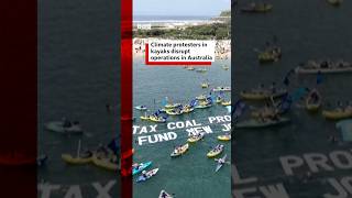 Climate protesters in kayaks disrupt operations at Australia port. #Australia #BBCNews